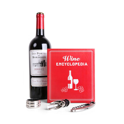 コルクスクリュー、ポアラー、クーラーがセットになった、ワインブックのようなサーブセット。