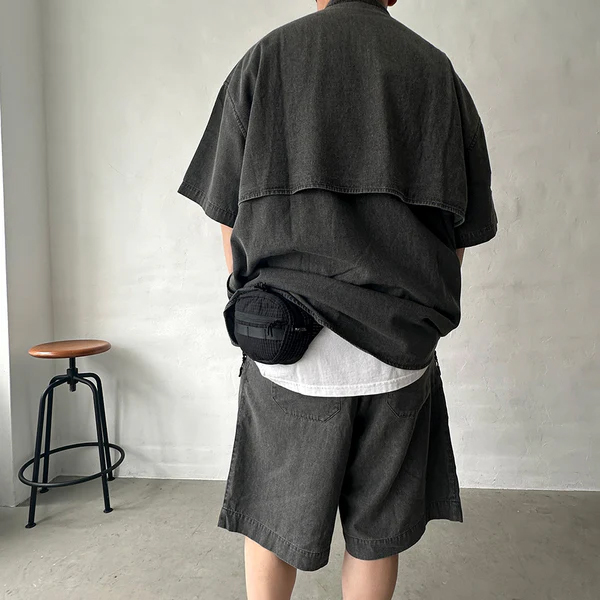 格子柄部分に反射糸を使った素材を使用したファニーパック。